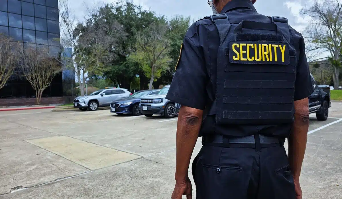 Security guard standing in parking lot