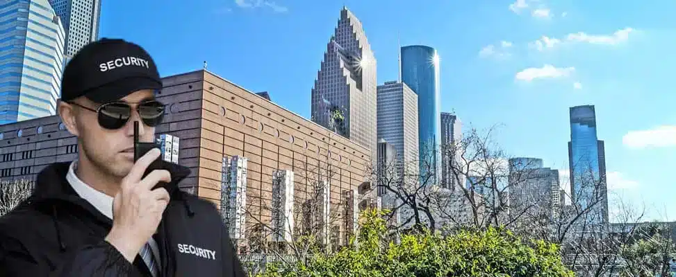 Security guard with city skyline background.