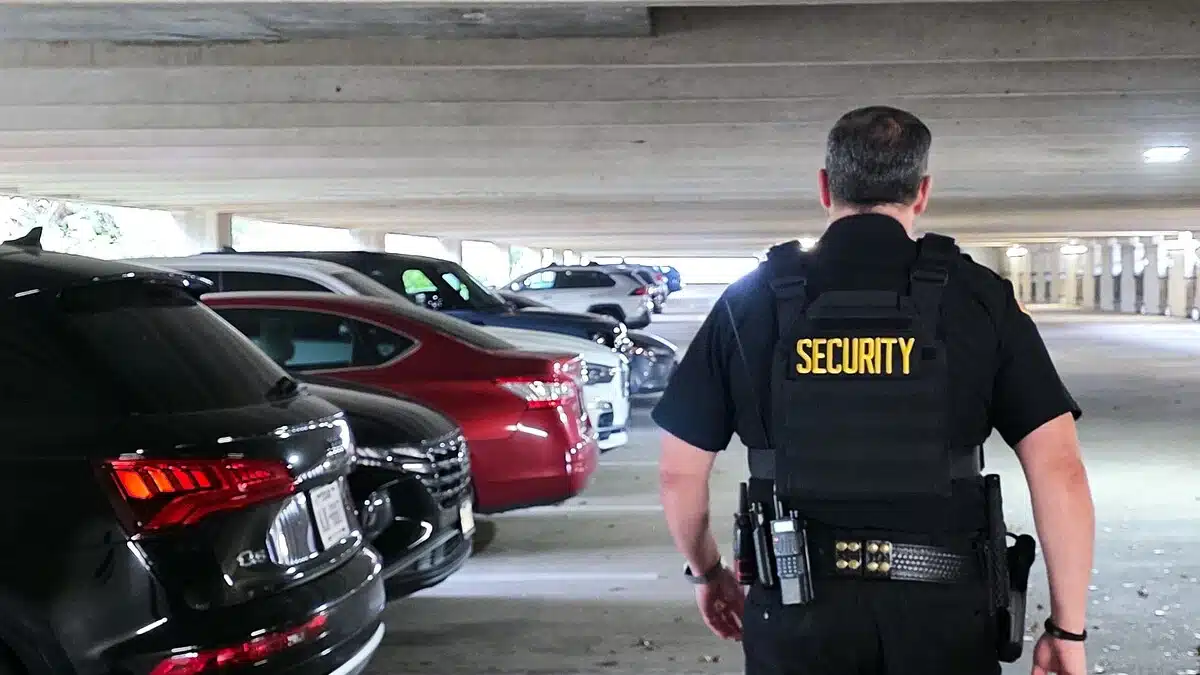 Security guard walking in parking garage